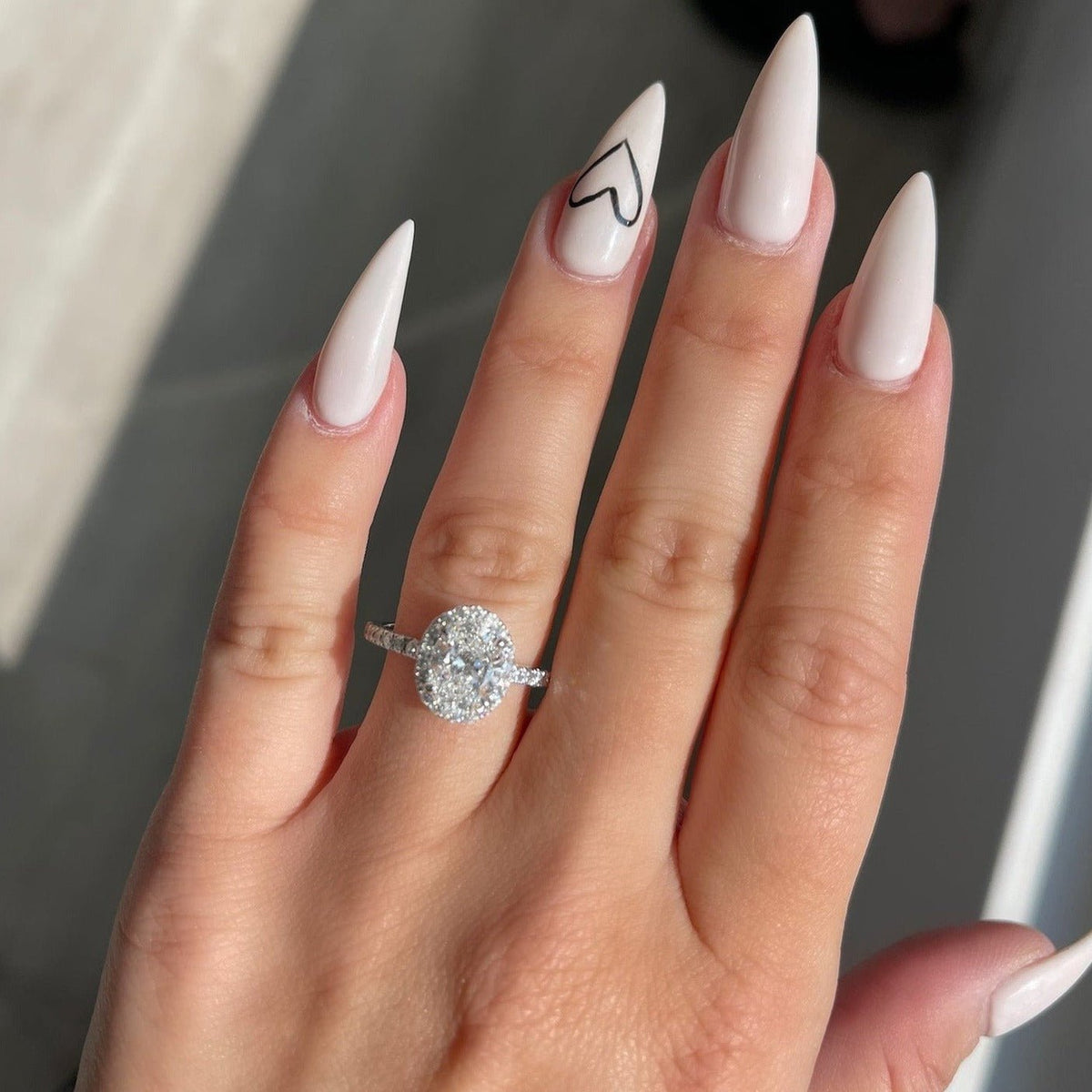 Oval Cut Halo Engagement Lab Grown Diamond Ring in 18K White Gold - Ring on Hand View
