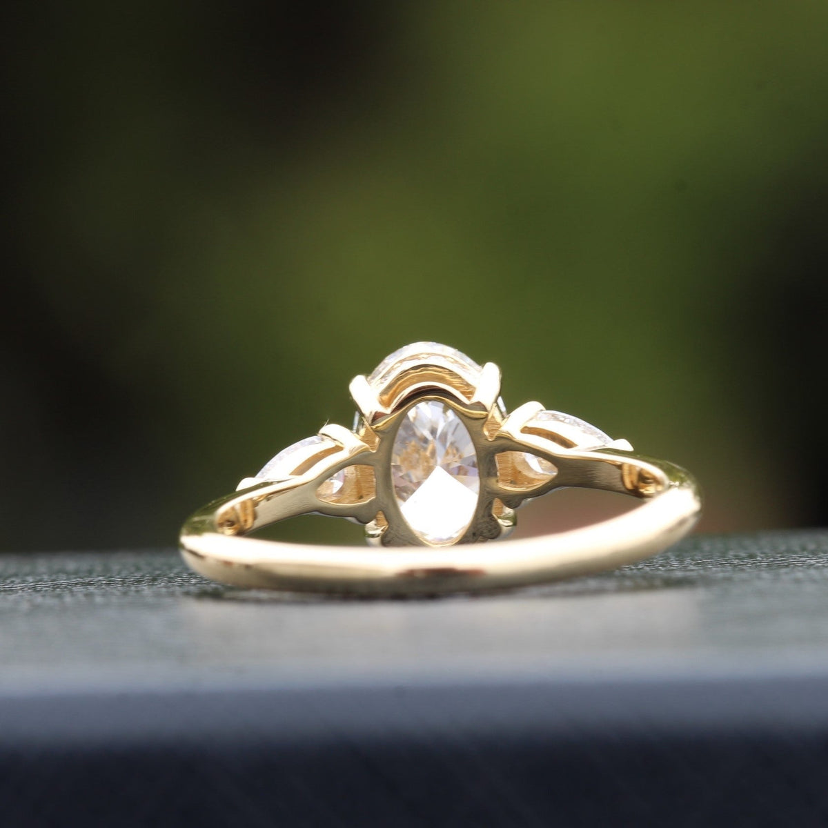 Oval Cut Hidden Halo Three Stone Lab Grown Diamond Ring in Platinum - Top View