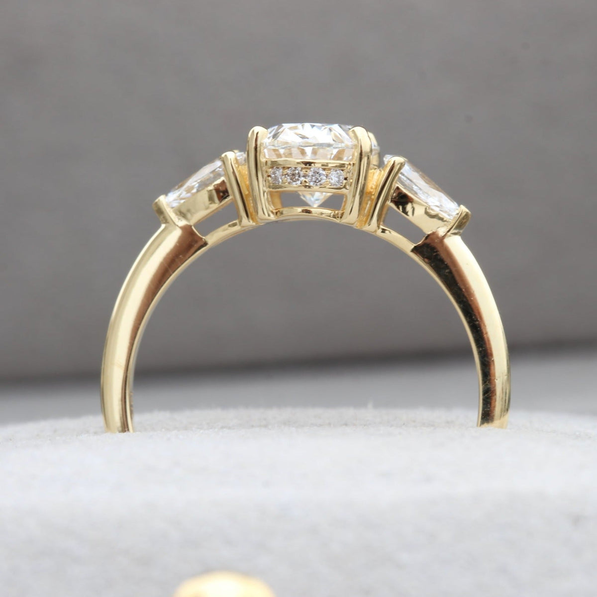 Oval Cut Hidden Halo Three Stone Lab Grown Diamond Ring in 18K - Angled View