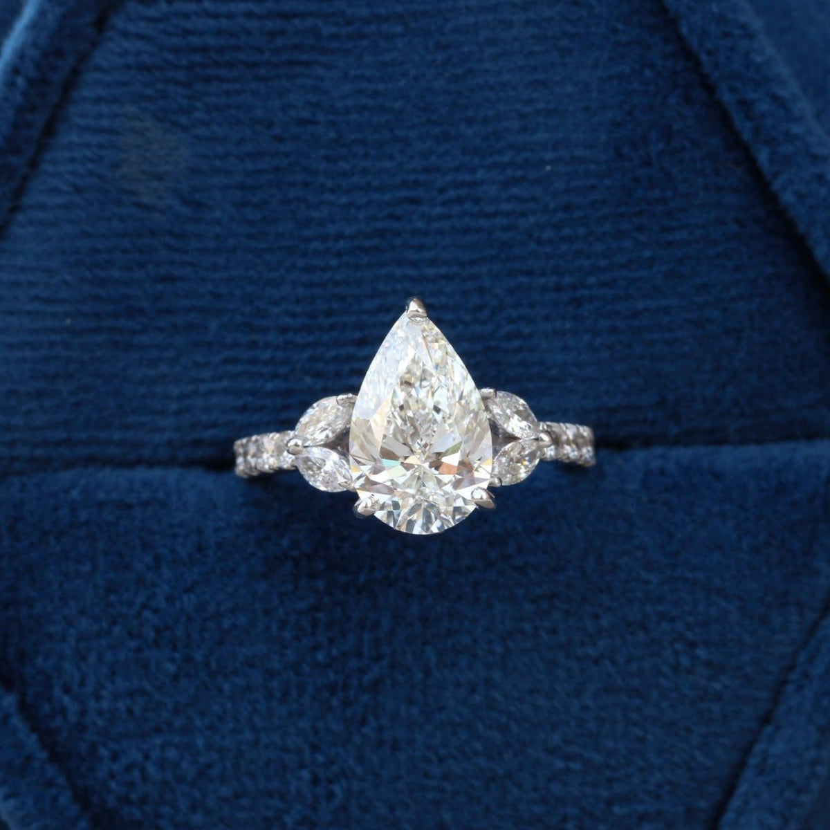 Pear Cut Hidden Halo Engagement Lab Grown Diamond Ring - Profile View