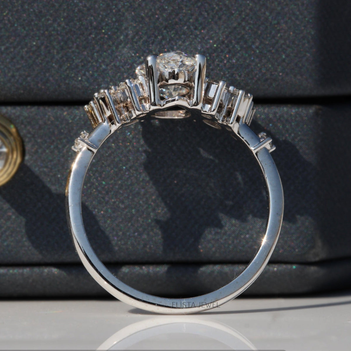 Pear Cut Solitaire Accent Engagement Lab Grown Diamond Ring - Close-up View